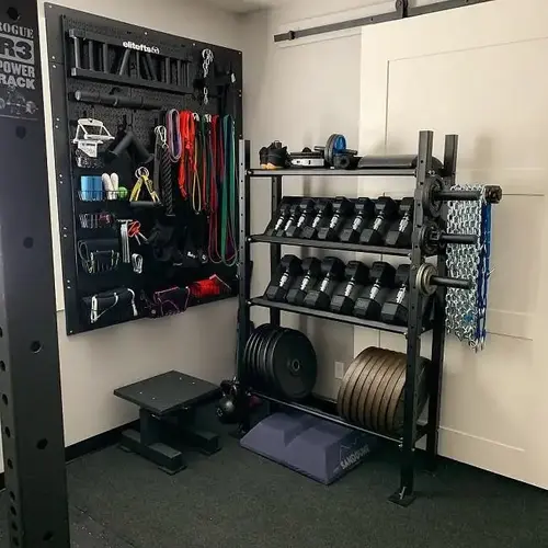 Outdoor Gym Ideas for Backyards: 15 Stylish & Practical Setups 19 Modern backyard gym under a pergola with fitness equipment and outdoor flooring