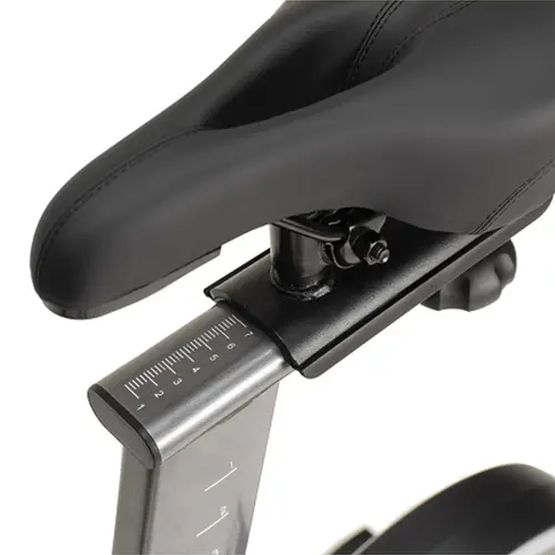 Adjustable exercise bike saddle and seat post