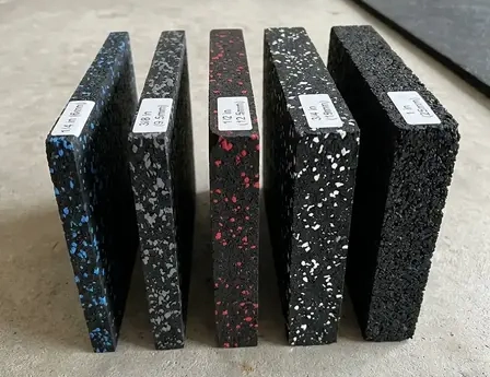 Rubber flooring samples showing several thicknesses for home gym use